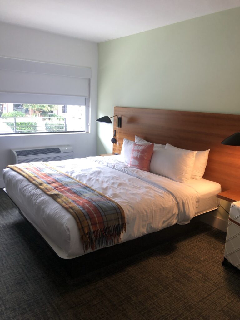 Bed in the hotel room at the Longleaf.