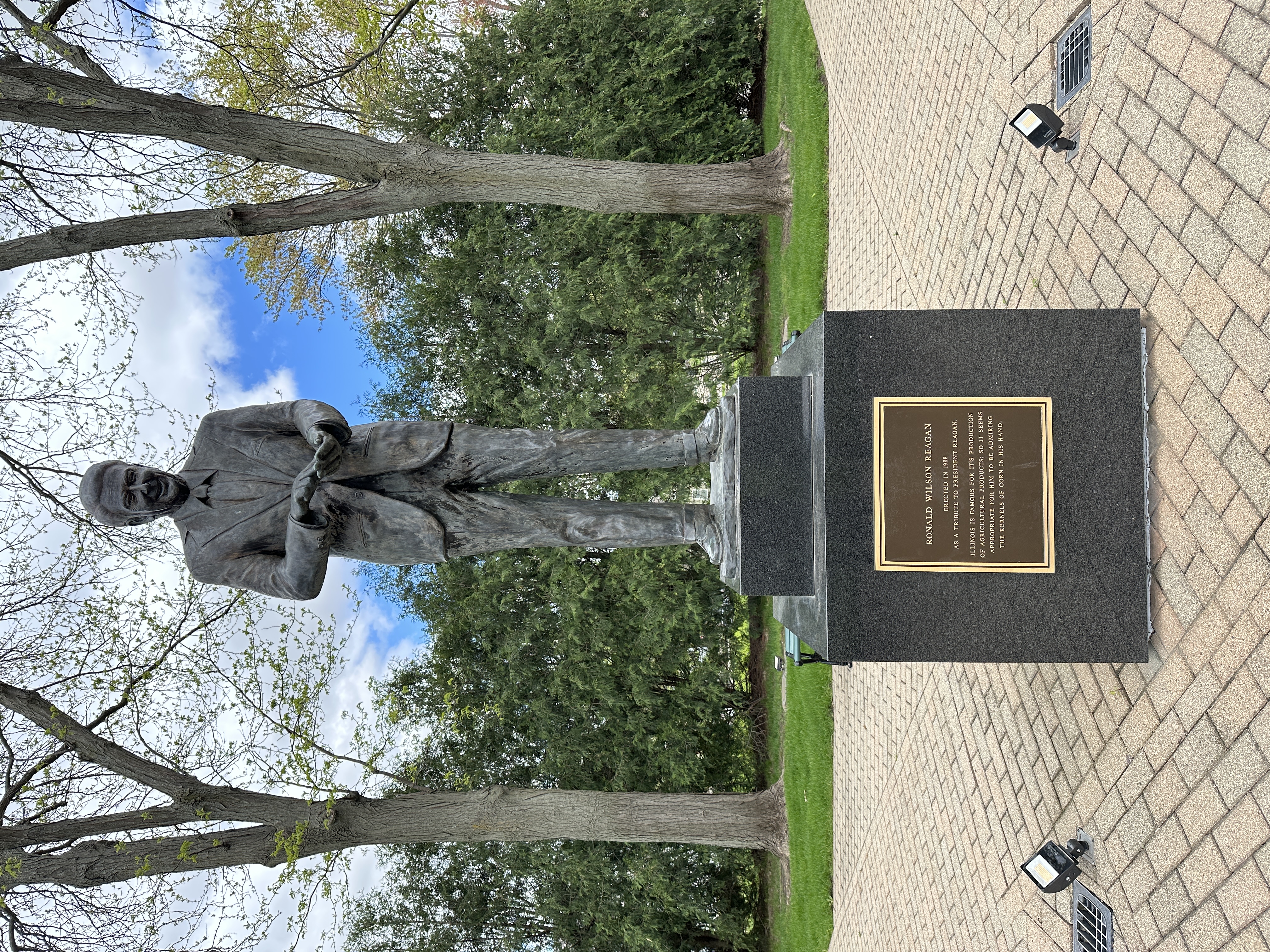 Ronald Reagan's statue standing on a pedestal.